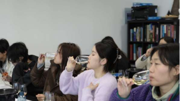 Students tasting wine
