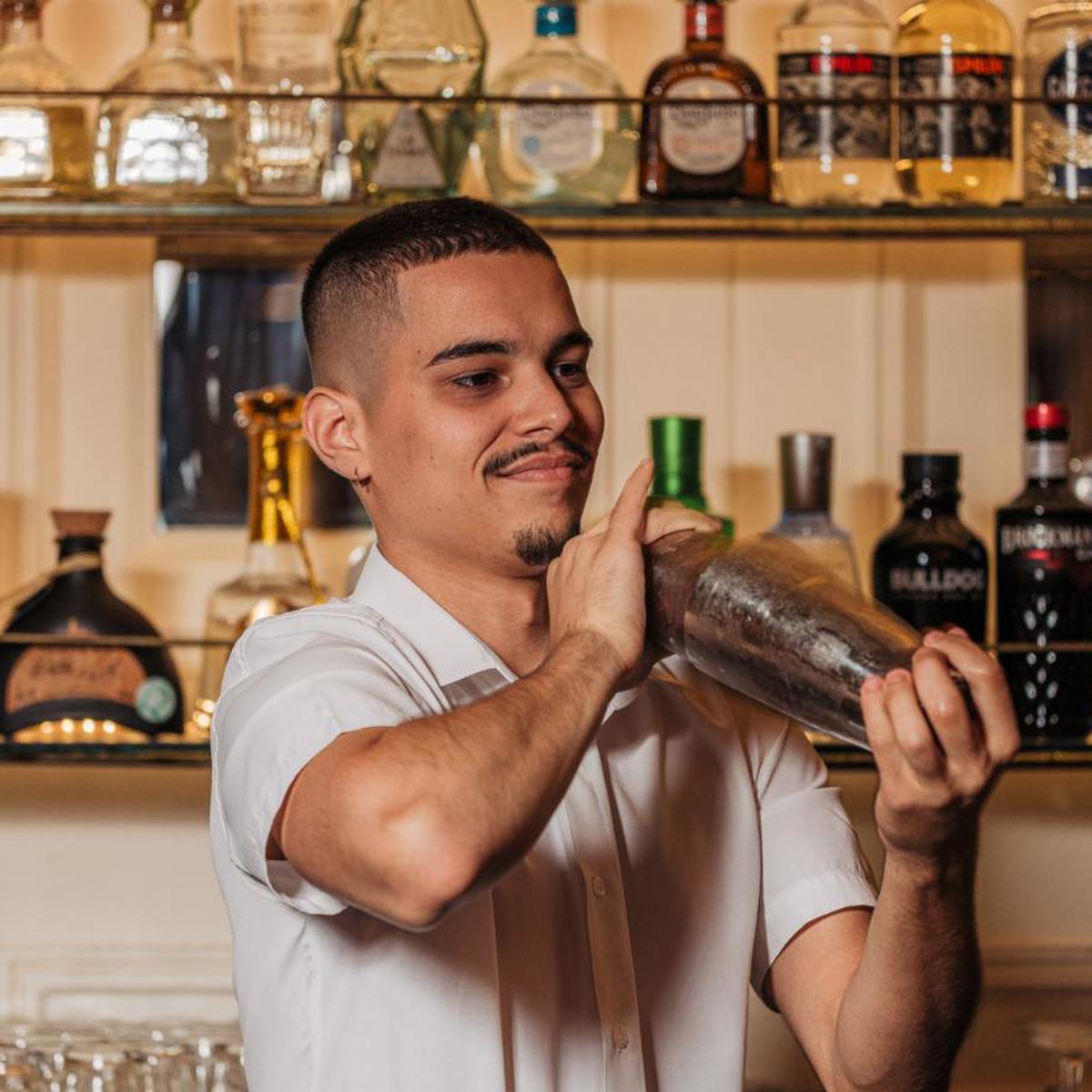 Man shaking cocktail