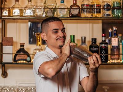 Man shaking cocktail
