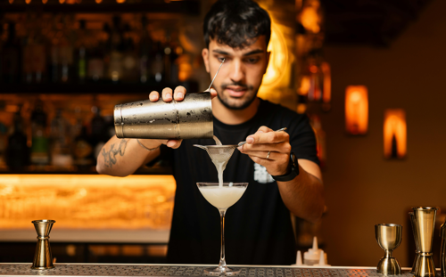 Man pouring cocktail