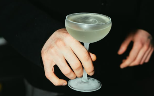 Hand holding cocktail