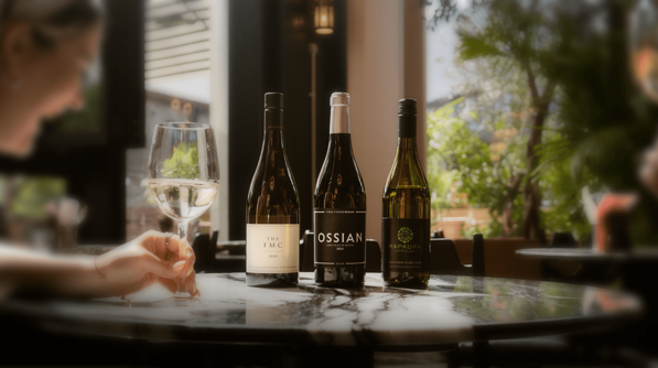 Wine bottles and glass on a table